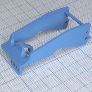 094.91.3, Пластмассовая прижимная скоба для розетки 94.84.3