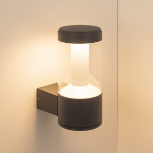 Светильник LGD-STEM-WALL-10W Warm3000 (GR, 185 deg, 230V) 029985, Настенный светильник для подсветки входных групп и фасадов зданий. Цвет ТЕПЛЫЙ БЕЛЫЙ 3000К, 10Вт (670лм). Влагозащищенный корпус IP65 - серый алюминий, экран из поликарбоната. Питание 230В, мощность10Вт. Размеры ДхШхВ - 176х110х240 мм.