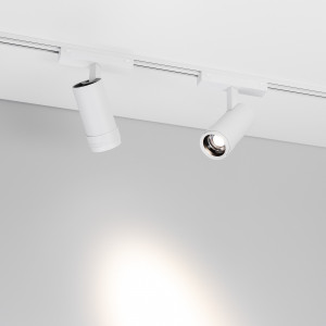 Светильник MAG-VIBE-SPOT-ZOOM-R47-10W Warm3000 (WH, 20-55 deg, 48V) 044484, Светильник для магнитных треков MAG-VIBE шириной 26 мм. Мощность 10 Вт, св. поток 765 лм, 77 лм/Вт, теплый 3000 K, CRI>90, угол 20-55°, напряжение питания 48 В. Белый фигурный корпус из алюминия, экран поликарбонат, степень защиты IP20. Размеры LxWxH 145x